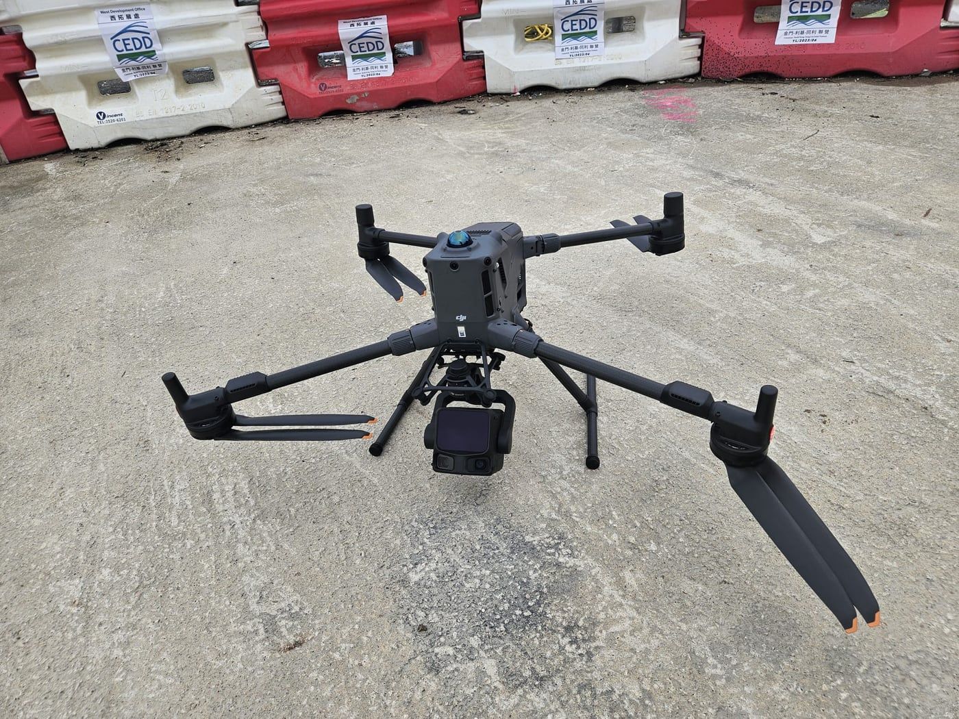 A survey drone on the ground at a CEDD works site